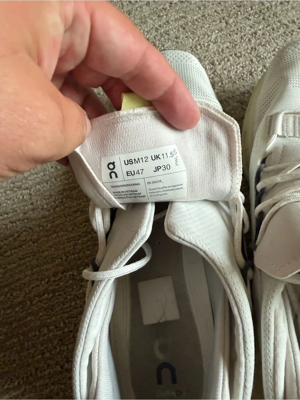 On Running Men’s Sneakers in White with Pale Yellow Accents